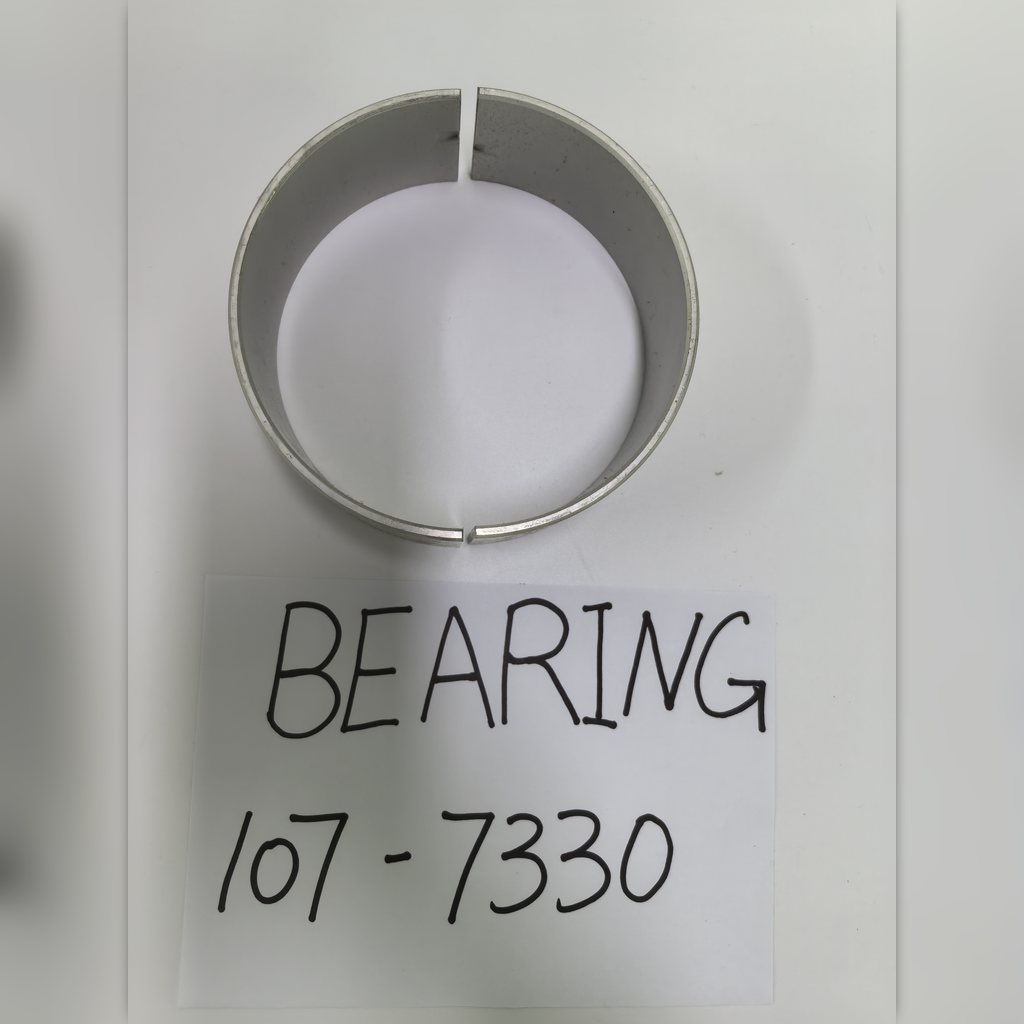 107-7330 Bearing - conn - bearing halves above an identification sheet