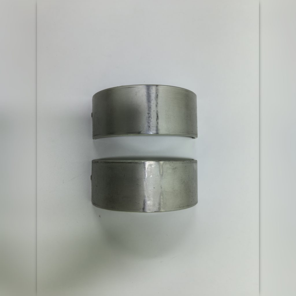 107-7330 Bearing - conn - two bearing halves laid side by side