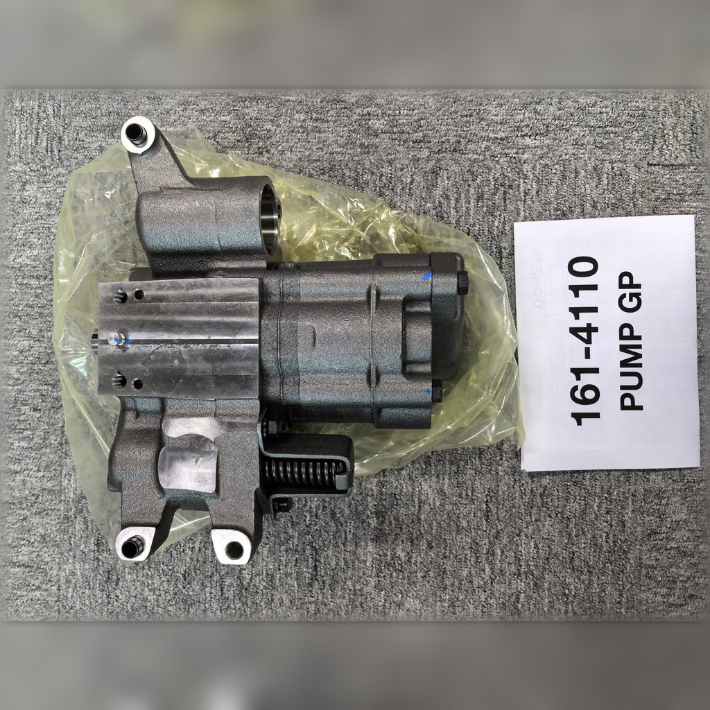 1614110 Engine Oil Pump Group - pump laid out horizontally above a part-number sheet