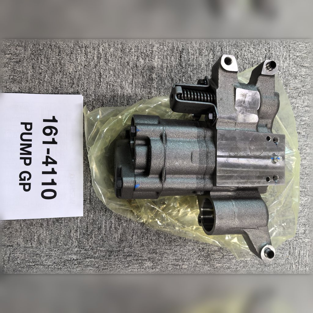 1614110 Engine Oil Pump Group - pump casing beside an identification sheet
