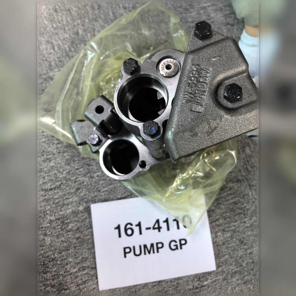 1614110 Engine Oil Pump Group - pump mounting face showing two circular openings