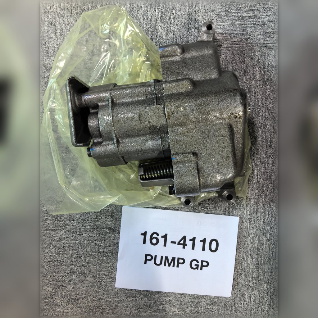 1614110 Engine Oil Pump Group - pump assembly above its identification sheet