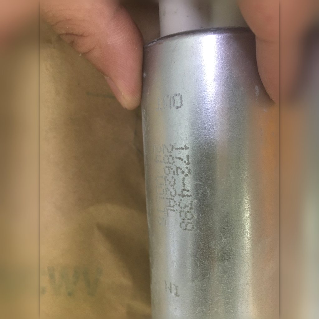 1724388 Fuel Pump Assembly - close-up of the metal pump housing