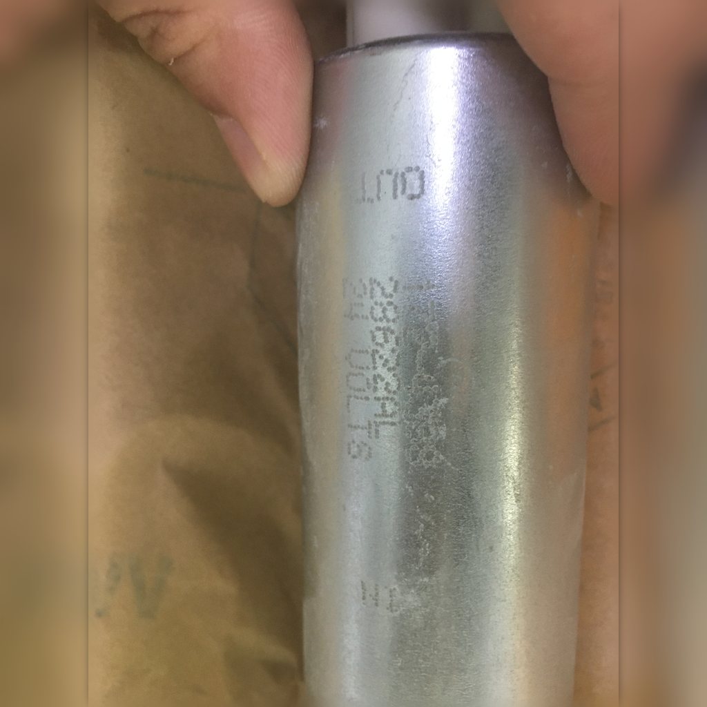 1724388 Fuel Pump Assembly - close-up of the pump body held in a hand
