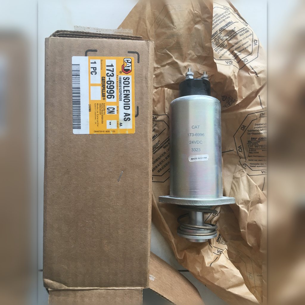 1736996 Solenoid assembly - solenoid beside its labeled carton