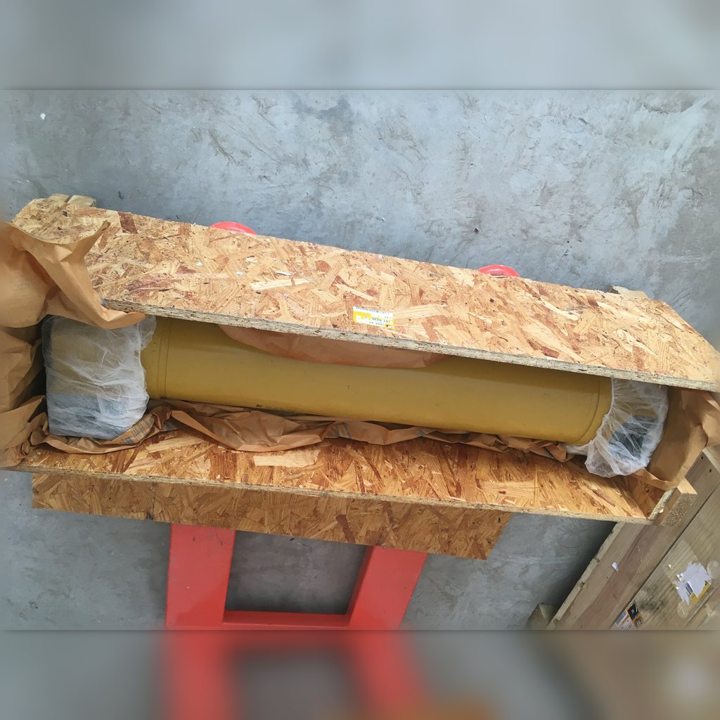 1919336 Core - long core packed in an open wooden crate