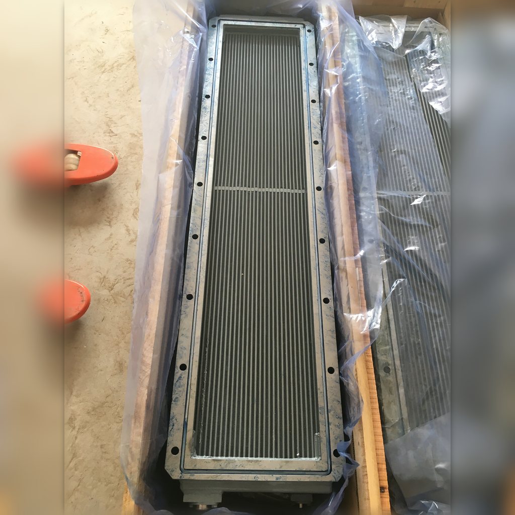 2364256 Aftercooler Core Assembly - core viewed lengthwise in protective wrapping