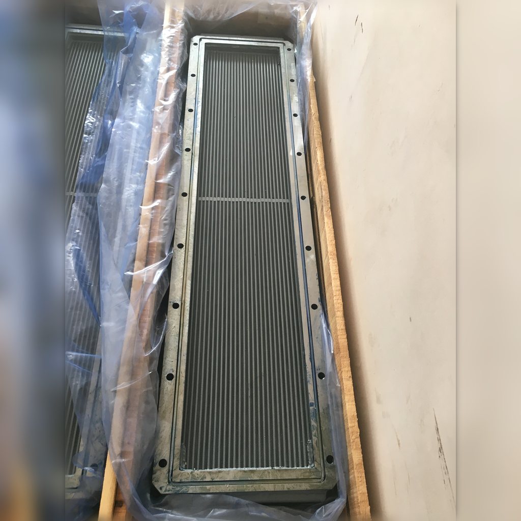 2364256 Aftercooler Core Assembly - long core standing inside its open crate
