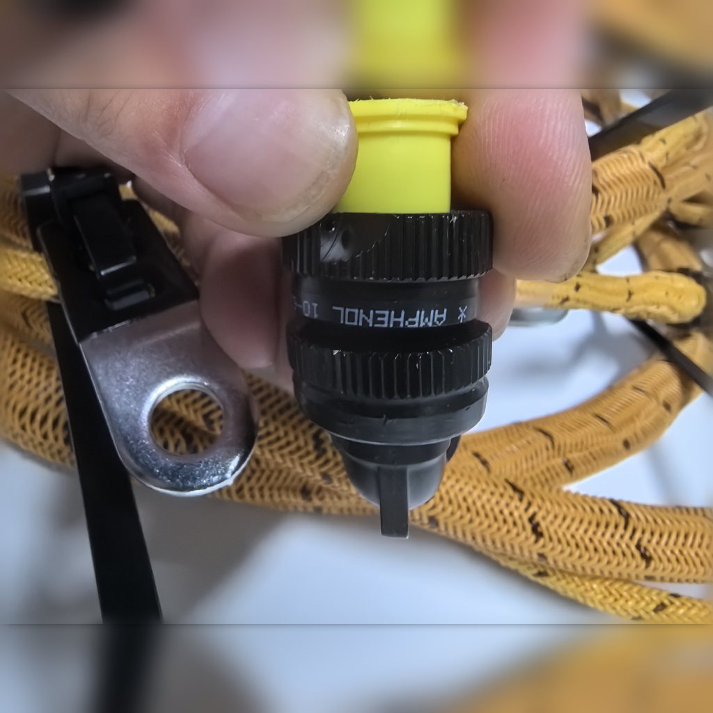 2776854 Harness assembly - harness connector held in a hand