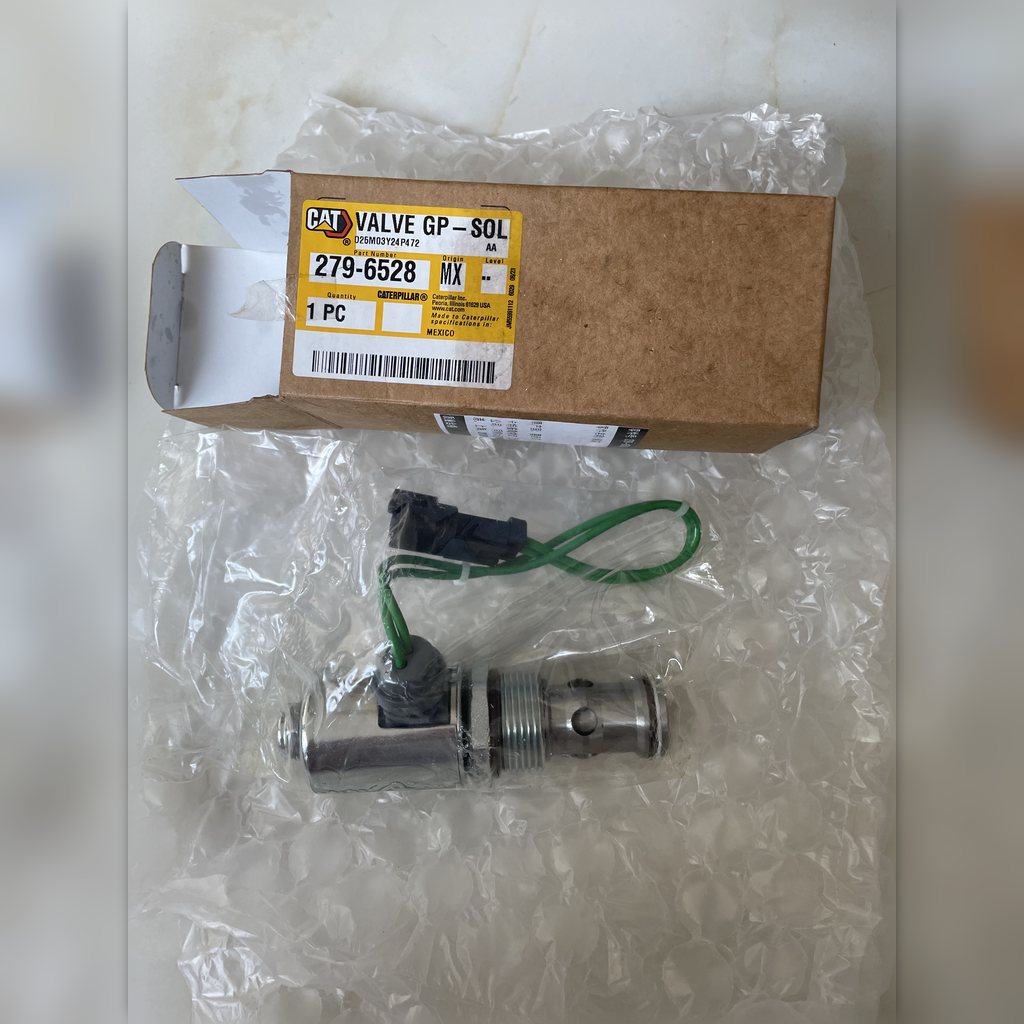 2796528 Valve group - valve and wire laid out with a label