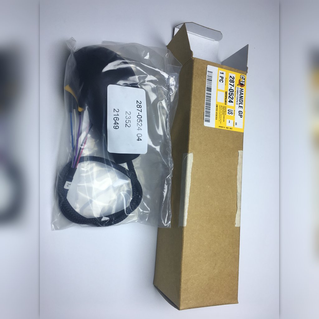 2870524 Electric hand control group - control and coiled cable beside the labeled carton