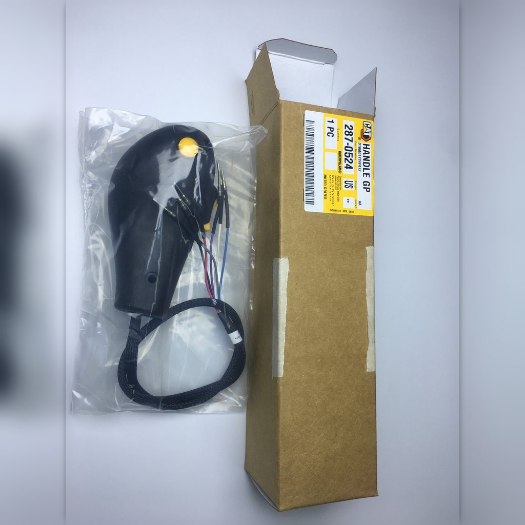 2870524 Electric hand control group - packaged hand control beside its open carton