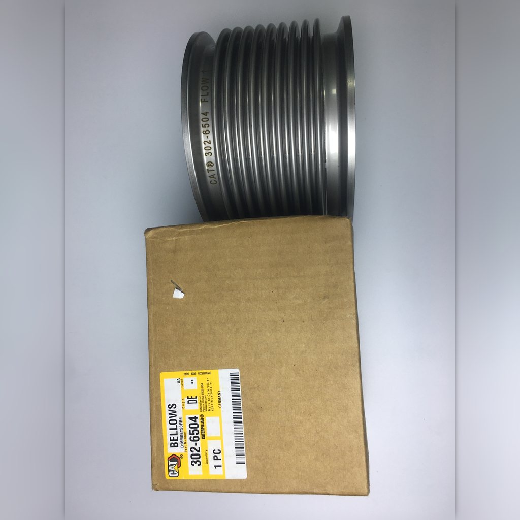 3026504 Bellows - bellows resting on a labeled carton