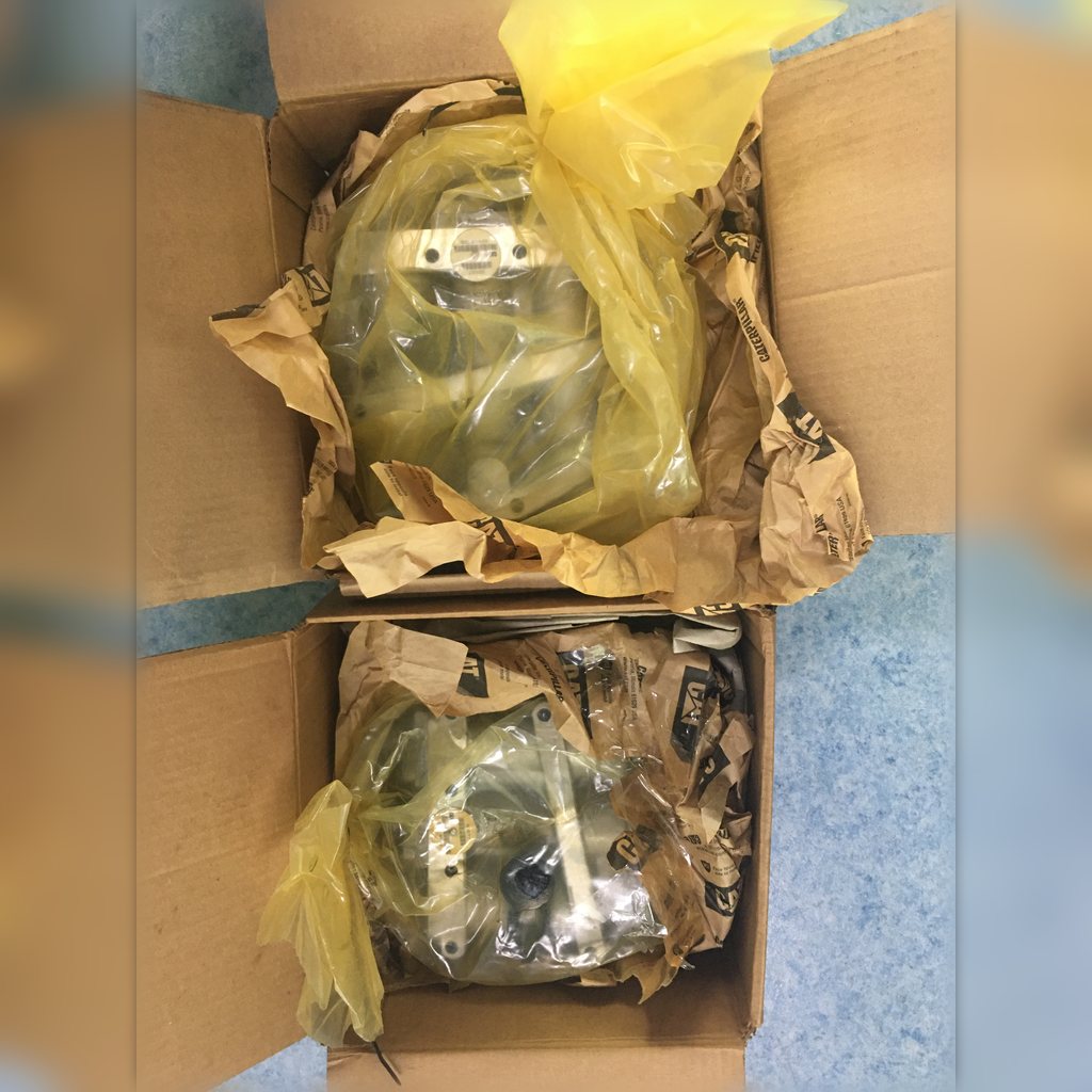 3049025 Relief Valve Group - wrapped valve components inside cartons