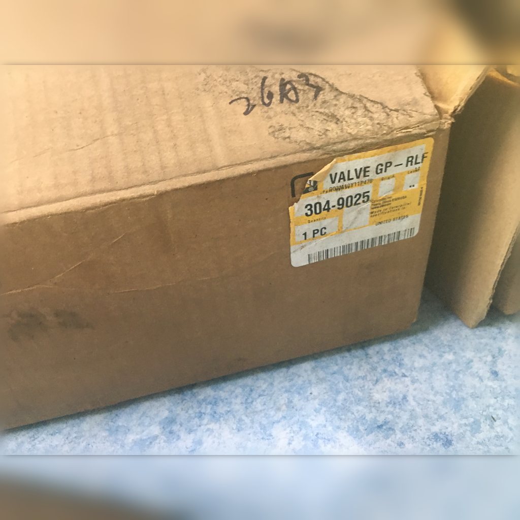 3049025 Relief Valve Group - large closed carton with a parts label
