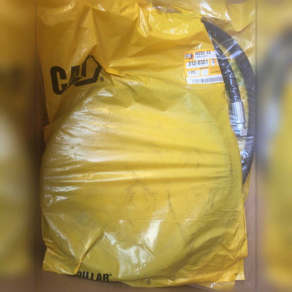 3128301 Hose assembly - hose coiled inside clear packaging