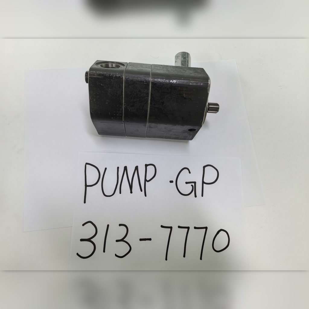 3137770 Fuel Transfer Pump Group - pump casing laid above a part-number sheet