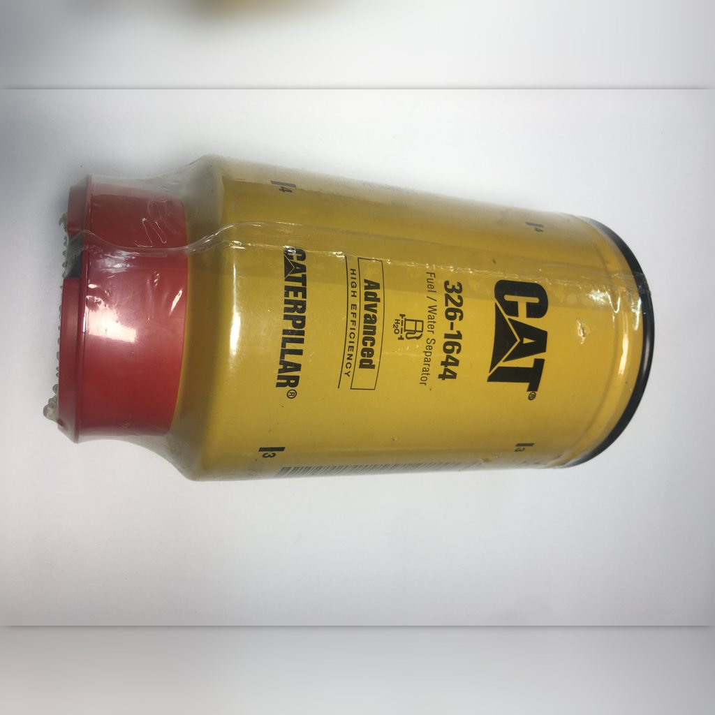 3261644 Separator Filter Assembly - filter lying sideways with a red protective cap