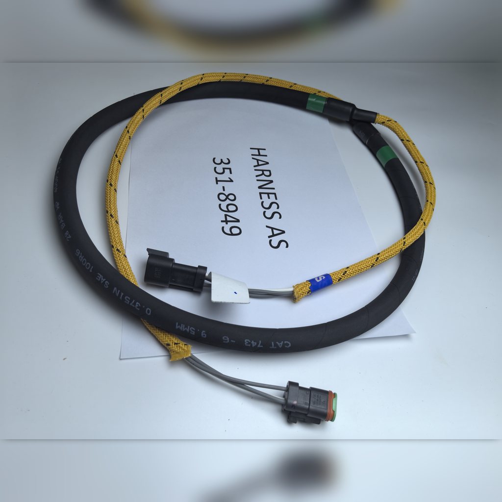 3518949 Harness assembly - coiled harness around an identification sheet