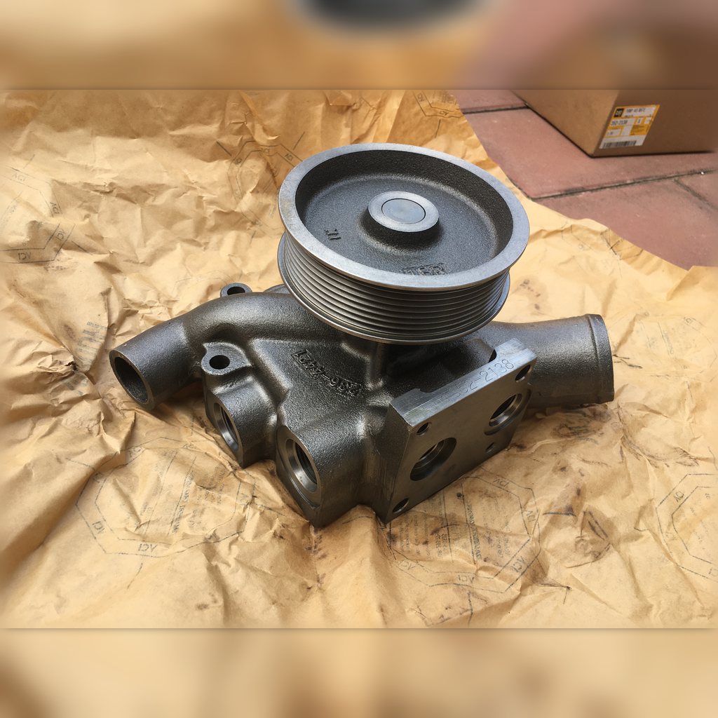 3522138 Water Pump Assembly - angled pump view on packing paper