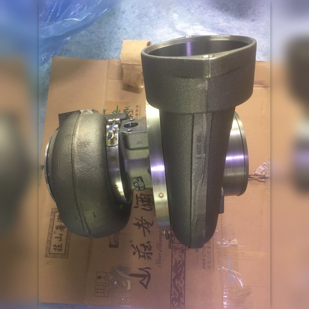 4451674 Turbocharger group - turbocharger standing on its shipping carton