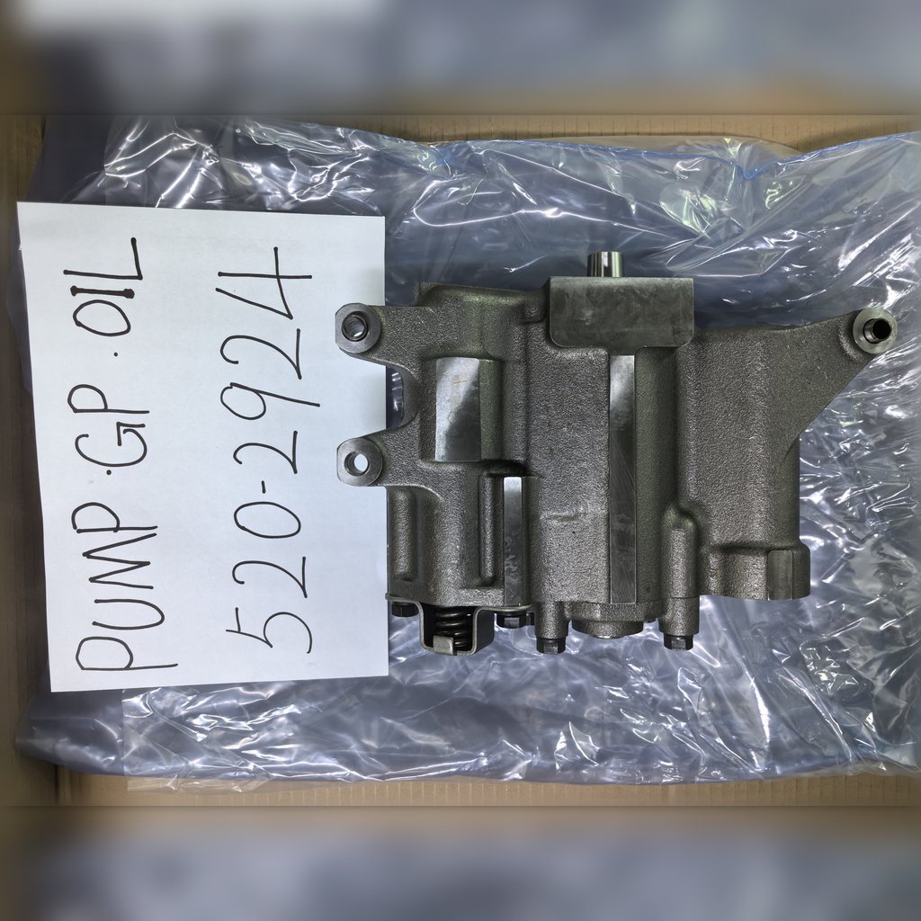 5202924 Engine Oil Pump Group - pump casing beside a part-number sheet