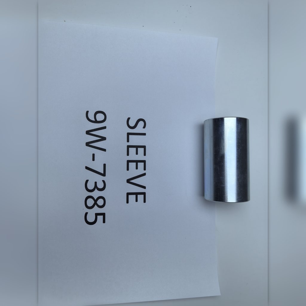 9W-7385 Sleeve - wrap - up - sleeve laid lengthwise beside an identification sheet